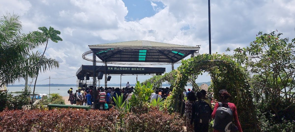 Crowd gathered at the KK Resort Beach lakeside stage during an event